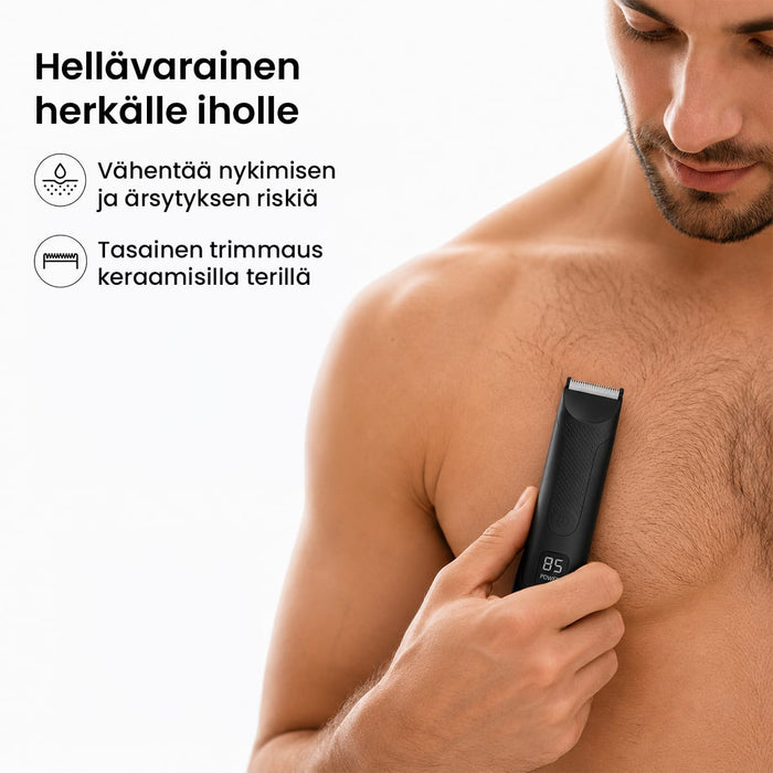 Mies ajelee rintakarvansa keraamisella vartalokarvatrimmerillä.