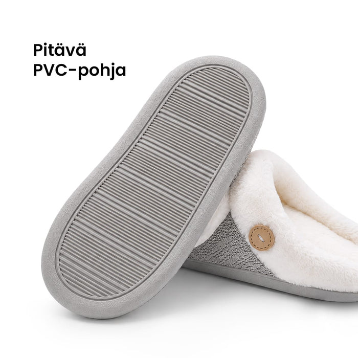 Harmaat, lämpimästi vuoratut tossut, joissa on pitävä PVC-pohja.